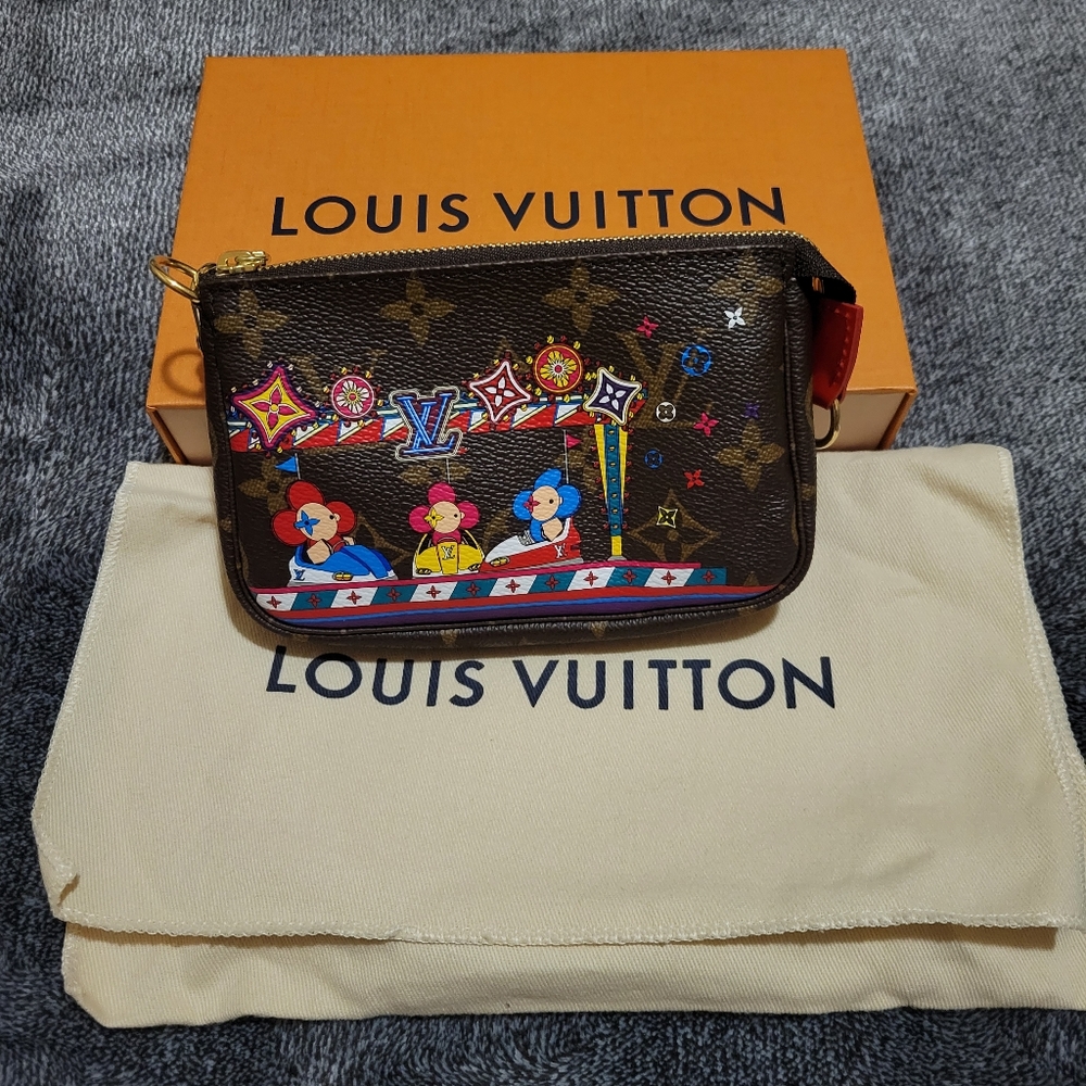 NWT. Louis Vuitton Mini Pochette